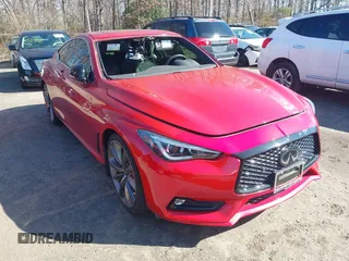 2021 Infiniti Q60 Red Sport 400 with VIN JN1FV7LL8MM560392, listed as a IAAI auction lot 41548964 with 14,057 mi miles and . Bid and sale history available at DreamBid. Image 1.