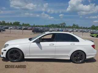 2014 Mercedes-Benz C 250 Sport with VIN WDDGF4HB5EA947035, listed as a IAAI auction lot 42538526 with 119,858 mi miles and . Bid and sale history available at DreamBid. Image 14.
