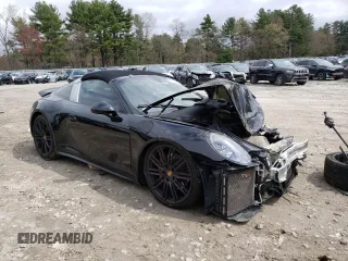 2016 Porsche 911 4S with VIN WP0BB2A94GS136383, listed as a Copart auction lot 52737084 with 54,027 mi miles and Salvage Title. Bid and sale history available at carsss.com. Image 4.