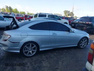 2015 Mercedes-Benz C with VIN WDDGJ4HB1FG372798, listed as a IAAI auction lot 41968536 with 56,007 mi miles. Bid and sale history available at carsss.com. Image 13.