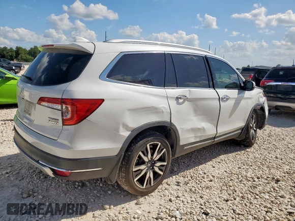 2020 Honda Pilot Touring 7-Passenger with VIN 5FNYF6H69LB018905, listed as a Copart auction lot 61209685 with 61,637 mi miles and Salvage title. Bid and sale history available at DreamBid. Image 3.