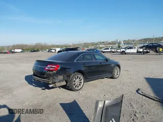 2016 Ford Taurus Limited with VIN 1FAHP2F87GG116553, listed as a IAAI auction lot 42070788 with 106,130 mi miles and . Bid and sale history available at DreamBid. Image 4.