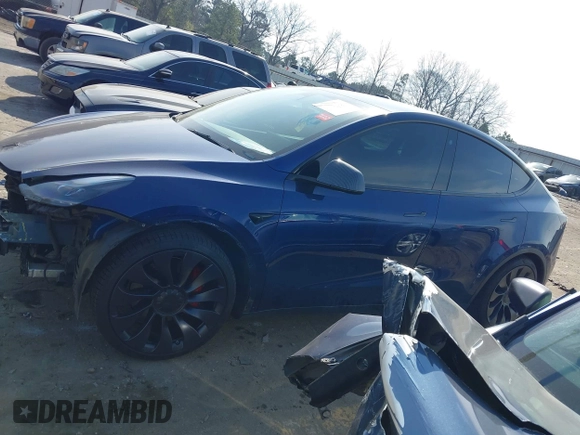 2022 Tesla Model Y Performance with VIN 7SAYGDEF7NF497076, listed as a IAAI auction lot 41759793 with 46,970 mi miles and . Bid and sale history available at DreamBid. Image 14.