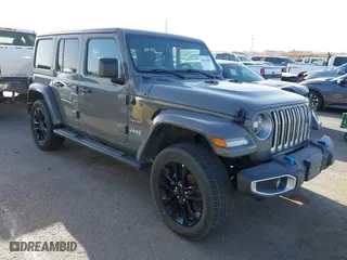 2023 Jeep Wrangler 4xe Sahara with VIN 1C4JJXP68PW661190, listed as a IAAI auction lot 41816483 with 41,877 mi miles. Bid and sale history available at carsss.com. Image 1.
