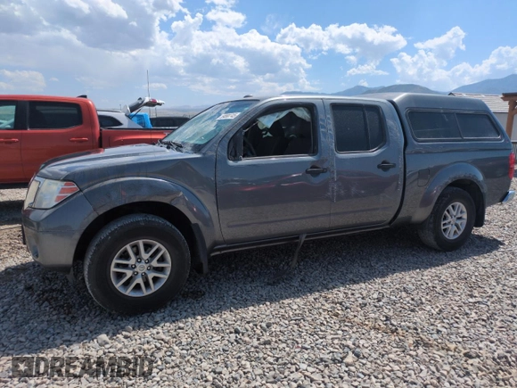 2016 Nissan Frontier SV with VIN 1N6AD0FV5GN780728, listed as a Copart auction lot 59890745 with 135,059 mi miles and Salvage title. Bid and sale history available at DreamBid. Image 1.