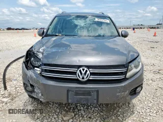 2014 Volkswagen Tiguan SEL с VIN WVGAV3AX7EW506170, выставлен на аукционе Copart как лот 58852355 с пробегом 55 961 миль миль и Списание • Salvage title. История ставок и продаж доступна на DreamBid. Изображение 5.