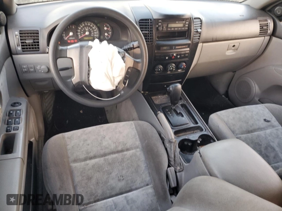 2005 Kia Sorento LX z VIN KNDJC733455442137, wystawiony jako Copart lot #46496065 z przebiegiem 118 299 mil mil oraz Szkoda całkowita • Salvage title. Historia ofert i sprzedaży dostępna na DreamBid. Obrazek 8.