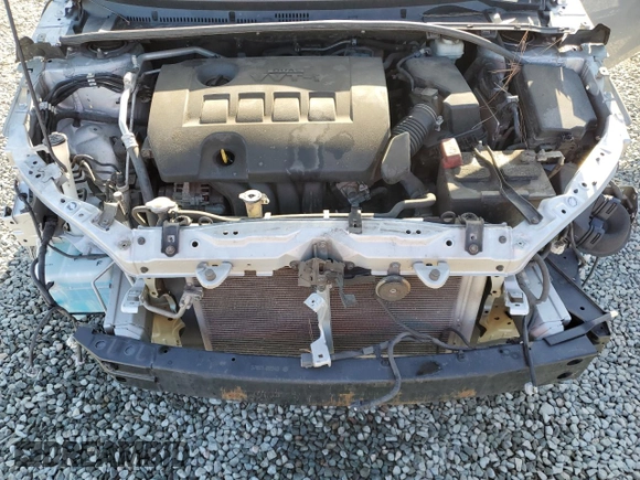 2019 Toyota Corolla L z VIN 5YFBURHE1KP922156, wystawiony jako Copart lot #51513865 z przebiegiem 211 756 mil mil oraz Szkoda całkowita • Salvage title. Historia ofert i sprzedaży dostępna na DreamBid. Obrazek 11.