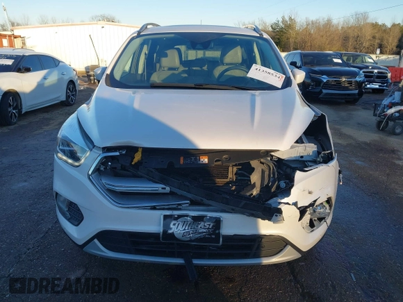2017 Ford Escape Titanium with VIN 1FMCU0J98HUA75690, listed as a IAAI auction lot 41358534 with 90,376 mi miles. Bid and sale history available at carsss.com. Image 13.