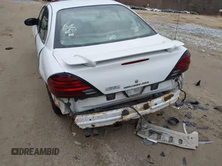 2005 Pontiac Grand Am SE with VIN 1G2NE52EX5M221381, listed as a IAAI auction lot 41677077 with 101,101 mi miles. Bid and sale history available at carsss.com. Image 6.