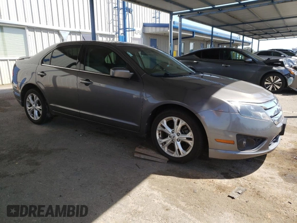 2012 Ford Fusion SE z VIN 3FAHP0HAXCR231865, wystawiony jako Copart lot #52644815 z przebiegiem 153 058 mil mil oraz Szkoda całkowita • Salvage title. Historia ofert i sprzedaży dostępna na DreamBid. Obrazek 4.
