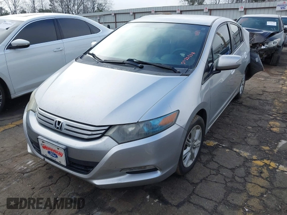 2010 Honda Insight EX with VIN JHMZE2H77AS022538, listed as a IAAI auction lot 41804579 with 184,000 mi miles and . Bid and sale history available at DreamBid. Image 16.