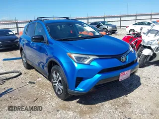 2017 Toyota RAV4 LE with VIN 2T3ZFREV2HW404424, listed as a IAAI auction lot 41862300 with 164,267 mi miles and . Bid and sale history available at carsss.com. Image 1.