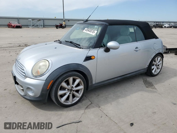 2011 MINI Convertible with VIN WMWZN3C53BTZ89332, listed as a Copart auction lot 45945515 with 25,809 mi miles and Salvage title. Bid and sale history available at DreamBid. Image 1.