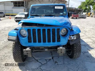 2021 Jeep Gladiator Sport S z VIN 1C6HJTAG0ML560089, wystawiony jako Copart lot #52817405 z przebiegiem 100 595 mil mil oraz Szkoda całkowita • Salvage title. Historia ofert i sprzedaży dostępna na DreamBid. Obrazek 5.