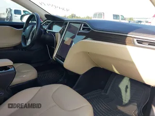 2014 Tesla Model S 60 with VIN 5YJSA1H12EFP39873, listed as a IAAI auction lot 42443414 with 132,773 mi miles and . Bid and sale history available at DreamBid. Image 5.