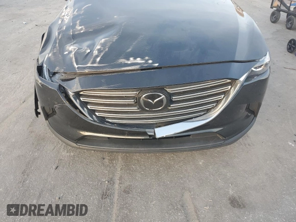 2021 Mazda CX-9 Sport with VIN JM3TCABYXM0515467, listed as a Copart auction lot 84933074 with Not provided miles and Salvage title. Bid and sale history available at DreamBid. Image 12.