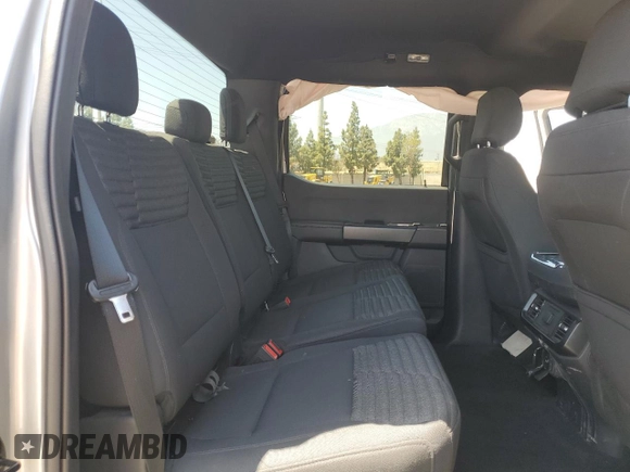 2021 Ford F-150 XL z VIN 1FTEW1EP5MKE42668, wystawiony jako Copart lot #57350175 z przebiegiem 39 727 mil mil oraz Szkoda całkowita • Salvage title. Historia ofert i sprzedaży dostępna na DreamBid. Obrazek 10.