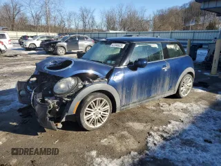 2014 MINI Hardtop S with VIN WMWXM7C51ET986340, listed as a Copart auction lot 42390825 with 71,558 mi miles and Salvage Title. Bid and sale history available at DreamBid. Image 1.
