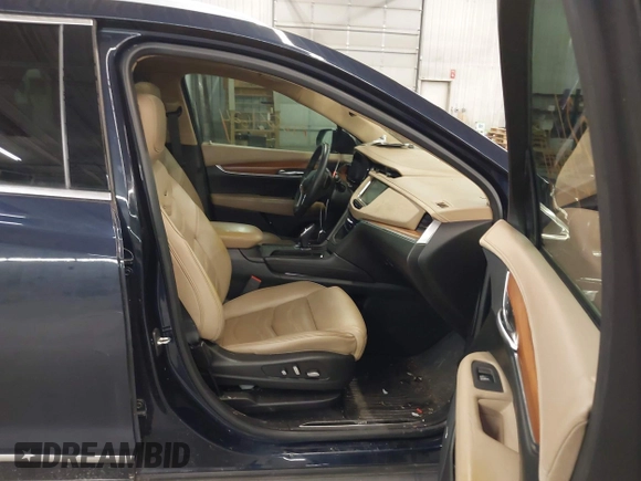 2017 Cadillac XT5 Platinum AWD with VIN 1GYKNFRS8HZ154135, listed as a IAAI auction lot 42031624 with 45,831 mi miles and . Bid and sale history available at DreamBid. Image 5.
