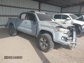 2019 Toyota Tacoma SR5 with VIN 3TMAZ5CN8KM091324, listed as a IAAI auction lot 41953421 with 129,782 mi miles and . Bid and sale history available at DreamBid. Image 1.