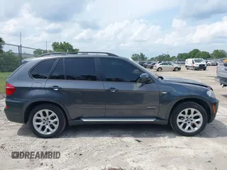 2012 BMW X5 35i z VIN 5UXZV4C5XCL990728, wystawiony jako IAAI lot #42386095 z przebiegiem 124 613 mil mil oraz . Historia ofert i sprzedaży dostępna na DreamBid. Obrazek 13.