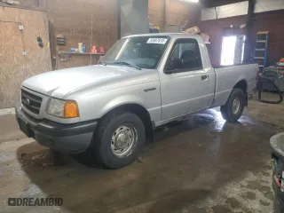 2002 Ford Ranger XL with VIN 1FTYR10D12PB70590, listed as a Copart auction lot 50987615 with 77,121 mi miles and Salvage Title. Bid and sale history available at carsss.com. Image 1.