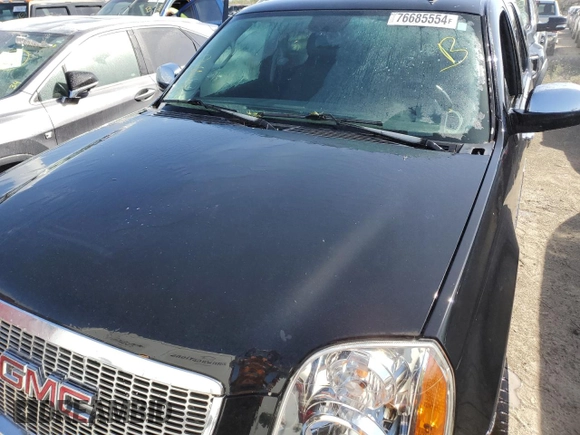 2009 GMC Yukon SLT w/4SB with VIN 1GKFC33019R280457, listed as a Copart auction lot 76685554 with 253,736 mi miles and Salvage Title. Bid and sale history available at carsss.com. Image 5.