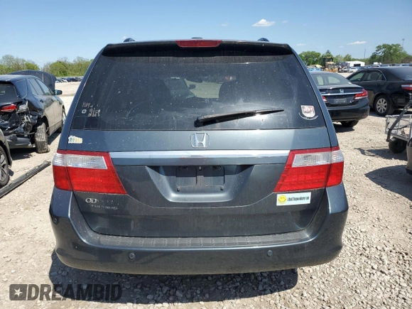2006 Honda Odyssey Touring z VIN 5FNRL38876B123895, wystawiony jako Copart lot #56414355 z przebiegiem 248 142 mil mil oraz Szkoda całkowita • Salvage title. Historia ofert i sprzedaży dostępna na DreamBid. Obrazek 6.
