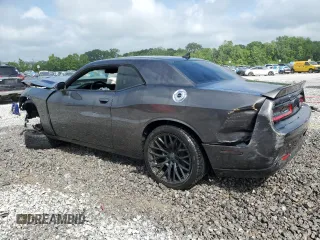 2017 Dodge Challenger T/A Plus with VIN 2C3CDZBT1HH509328, listed as a Copart auction lot 55960515 with 147,823 mi miles and Salvage title. Bid and sale history available at DreamBid. Image 2.