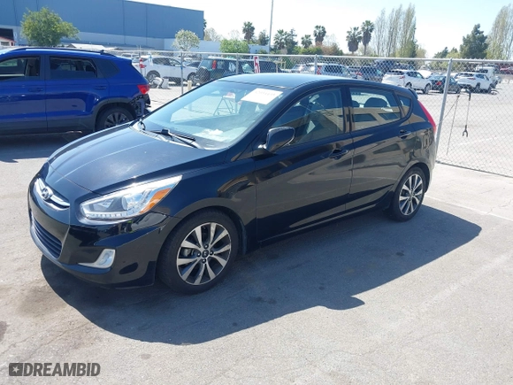 2017 Hyundai Accent Sport with VIN KMHCU5AE4HU355990, listed as a IAAI auction lot 42034435 with 181,831 mi miles. Bid and sale history available at carsss.com. Image 18.