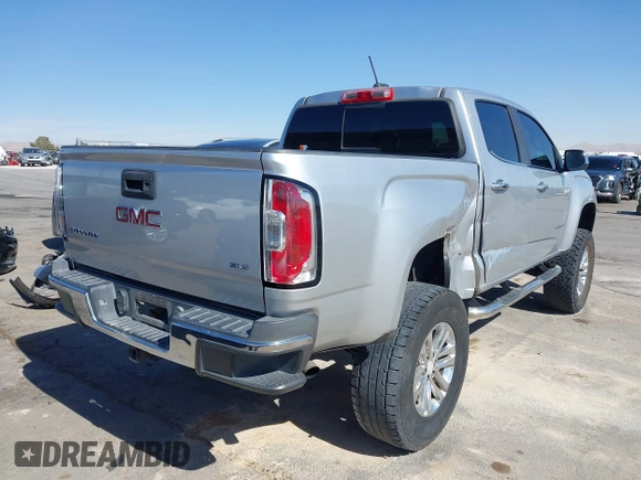 2016 GMC Canyon 2WD SLT with VIN 1GTG5DE36G1104362, listed as a IAAI auction lot 41517077 with 169,641 mi miles. Bid and sale history available at carsss.com. Image 4.