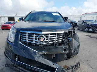 2014 Cadillac SRX Luxury Collection with VIN 3GYFNBE36ES587292, listed as a IAAI auction lot 41944420 with 150,136 mi miles and . Bid and sale history available at DreamBid. Image 12.