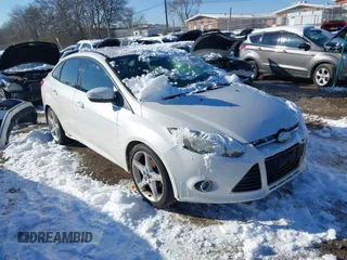 2014 Ford Focus Titanium with VIN 1FADP3J28EL233876, listed as a IAAI auction lot 41295444 with 155,423 mi miles. Bid and sale history available at carsss.com. Image 1.