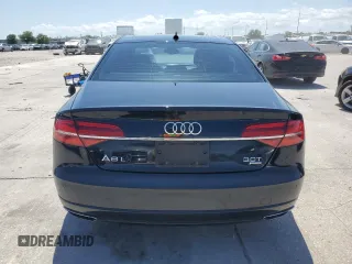 2018 Audi A8 z VIN WAU44AFD0JN000880, wystawiony jako Copart lot #54751235 z przebiegiem 76 161 mil mil oraz Szkody całkowita. Historia ofert i sprzedaży dostępna na DreamBid. Obrazek 6.