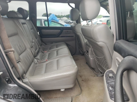 2005 Toyota Land Cruiser z VIN JTEHT05J752069738, wystawiony jako Copart lot #60536425 z przebiegiem Nie podano mil oraz Czysty tytuł • Clean title. Historia ofert i sprzedaży dostępna na DreamBid. Obrazek 11.