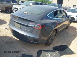 2019 Tesla Model 3 Long Range with VIN 5YJ3E1EB2KF510398, listed as a IAAI auction lot 42067654 with 108,971 mi miles and . Bid and sale history available at DreamBid. Image 4.