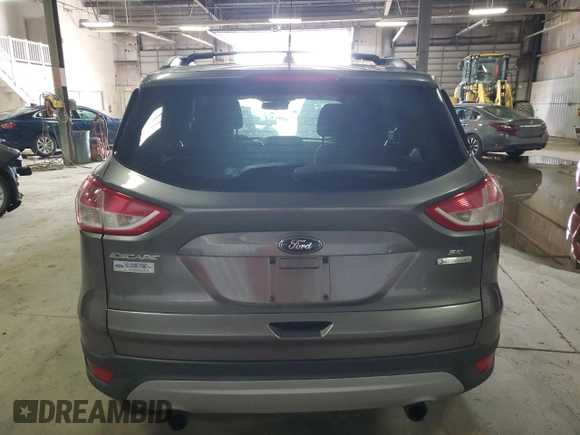 2013 Ford Escape SE z VIN 1FMCU0GX5DUD15830, wystawiony jako Copart lot #58007265 z przebiegiem 197 675 mil mil oraz Szkoda całkowita • Salvage title. Historia ofert i sprzedaży dostępna na DreamBid. Obrazek 6.
