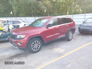 2014 Jeep Grand Cherokee Limited with VIN 1C4RJFBG8EC553860, listed as a IAAI auction lot 42452419 with 174,274 mi miles and . Bid and sale history available at DreamBid. Image 2.
