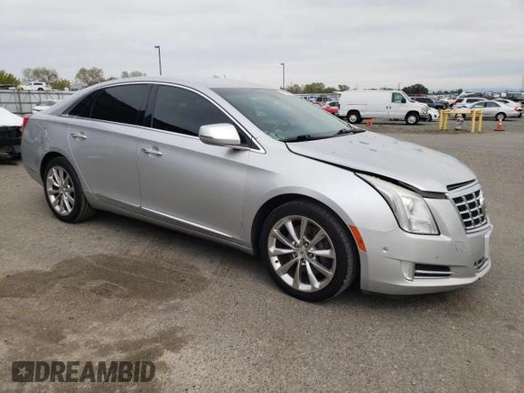 2014 Cadillac XTS Luxury with VIN 2G61M5S31E9217117, listed as a Copart auction lot 49659075 with 104,988 mi miles and Salvage Title. Bid and sale history available at DreamBid. Image 4.