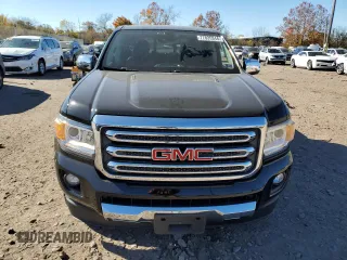 2016 GMC Canyon 4WD SLT with VIN 1GTP6DE11G1357147, listed as a Copart auction lot 77835344 with 106,890 mi miles and Salvage Title. Bid and sale history available at carsss.com. Image 5.