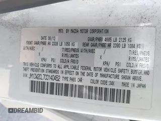 2012 Mazda 5 Touring with VIN JM1CW2CL7C0140452, listed as a IAAI auction lot 41970209 with 92,069 mi miles and . Bid and sale history available at DreamBid. Image 9.
