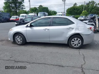 2016 Toyota Corolla L z VIN 2T1BURHEXGC488178, wystawiony jako IAAI lot #42308517 z przebiegiem 136 114 mil mil oraz . Historia ofert i sprzedaży dostępna na DreamBid. Obrazek 14.