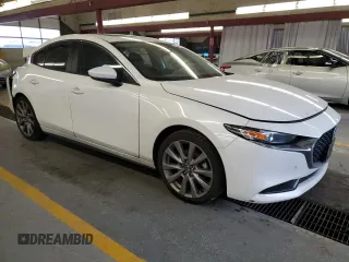 2021 Mazda 3 Preferred with VIN 3MZBPBCM2MM208721, listed as a Copart auction lot 82787294 with 96,891 mi miles and Salvage Title. Bid and sale history available at DreamBid. Image 4.