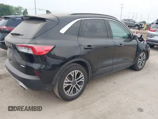 2020 Ford Escape SEL with VIN 1FMCU0H63LUA31648, listed as a IAAI auction lot 42295744 with 94,889 mi miles and . Bid and sale history available at DreamBid. Image 4.