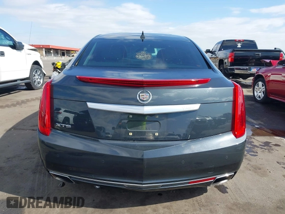 2013 Cadillac XTS Luxury with VIN 2G61P5S31D9182553, listed as a IAAI auction lot 42076227 with 116,849 mi miles and . Bid and sale history available at DreamBid. Image 17.