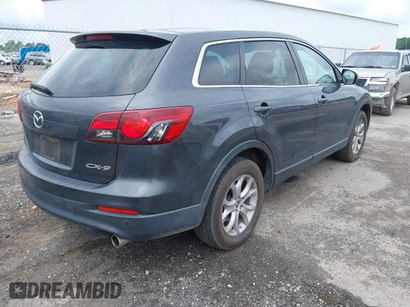 2014 Mazda CX-9 Touring z VIN JM3TB2CAXE0445450, wystawiony jako IAAI lot #42477260 z przebiegiem 139 583 mil mil oraz . Historia ofert i sprzedaży dostępna na DreamBid. Obrazek 4.