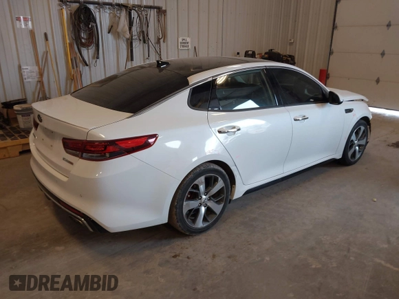 2018 Kia Optima SX with VIN 5XXGW4L27JG237960, listed as a IAAI auction lot 41956461 with 87,085 mi miles and . Bid and sale history available at DreamBid. Image 4.