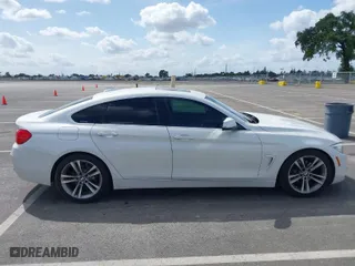 2016 BMW 4 Series 428i with VIN WBA4A9C51GGL88011, listed as a IAAI auction lot 41852057 with 117,669 mi miles. Bid and sale history available at carsss.com. Image 13.