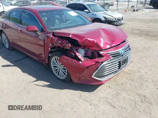 2021 Toyota Avalon Limited Hybrid z VIN 4T1DA1AB2MU008826, wystawiony jako IAAI lot #42220271 z przebiegiem 53 938 mil mil oraz . Historia ofert i sprzedaży dostępna na DreamBid. Obrazek 6.